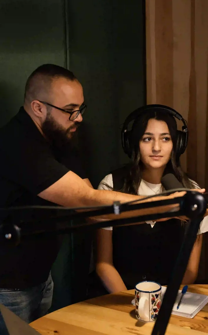 SOWT team members in a recording studio